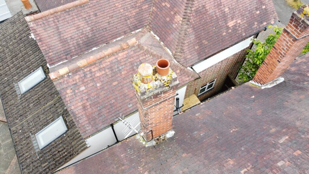 alt="drone view of chimney by surveyor in leicester"