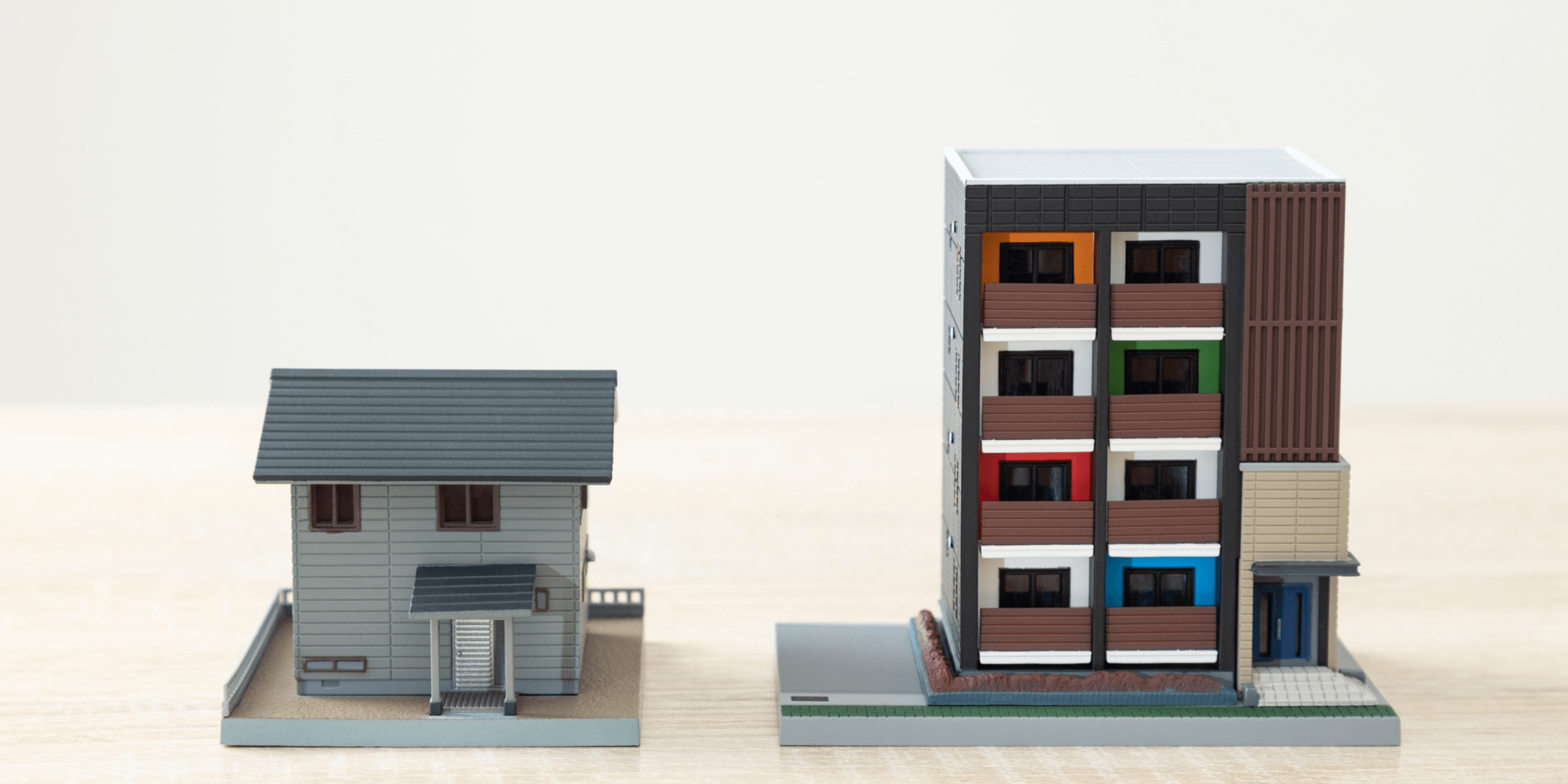 small model buildings on table