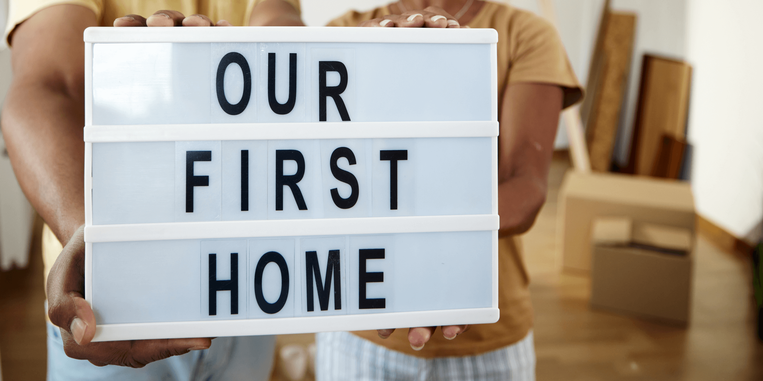 Image of letter lightbox saying 'our first home'